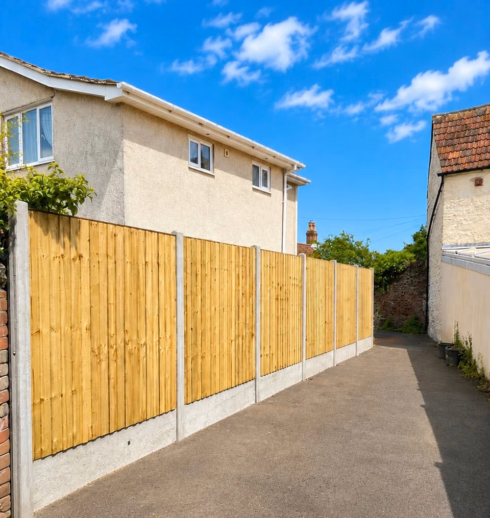 New closeboard garden fencing installed with concrete posts and gravel boards