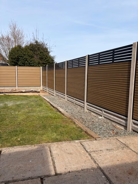 Alpha Decking Willow composite fence panels with slatted trellis and concrete supports in Stoke Gifford